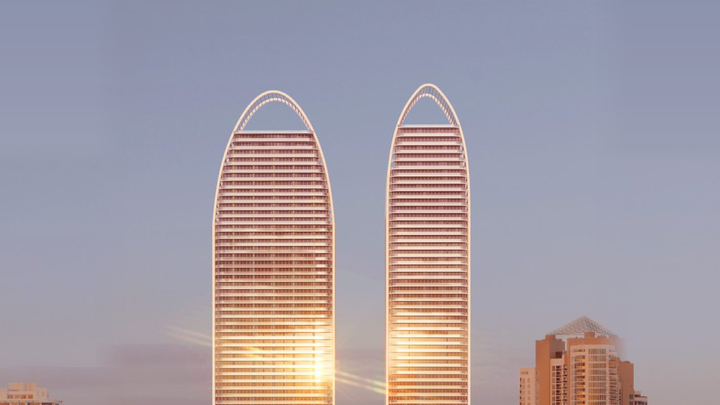 Rendering of the crown of the North Tower at The St Regis Residences Sunny Isles Beach at dusk, with the Intracoastal and the Miami skyline beyond