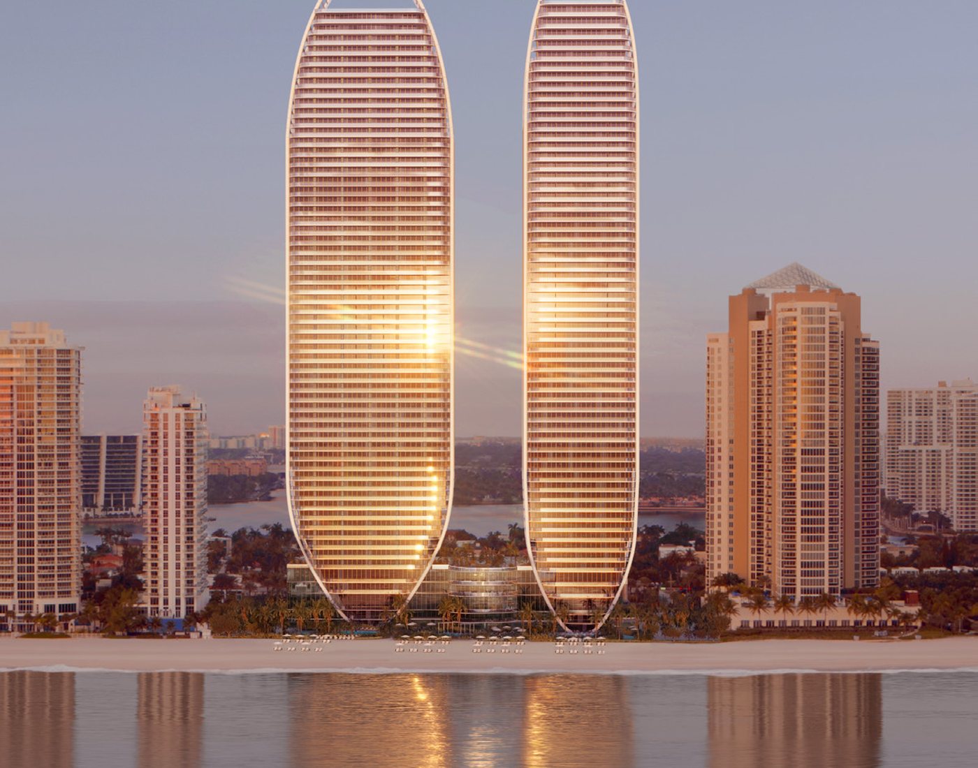 Rendering of the two elliptical St Regis Residences towers at dusk, seen across the water from the Intracoastal