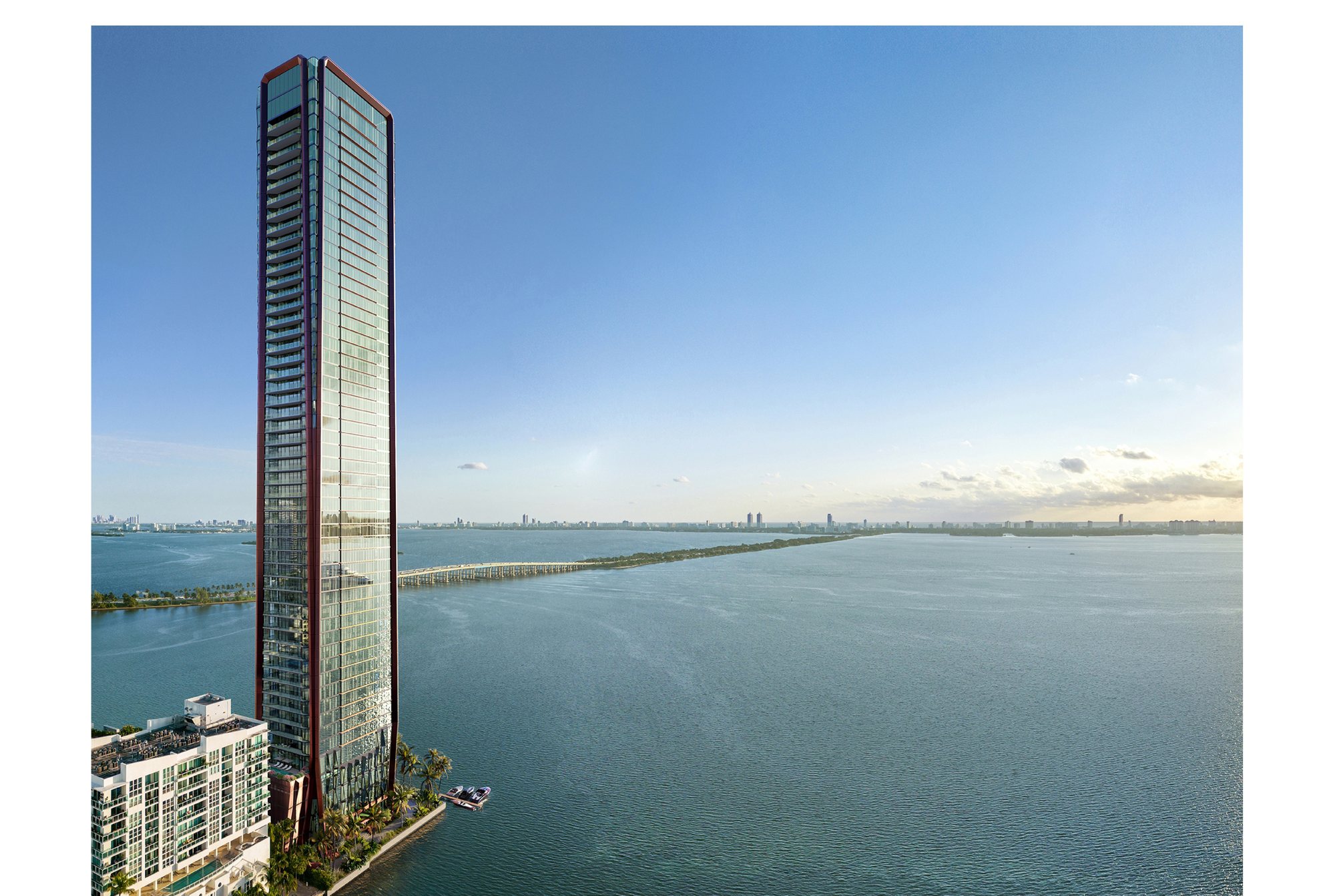 Render de la torre Villa Miami elevándose desde la bahía en Edgewater con la bahía de Biscayne y la calzada al fondo